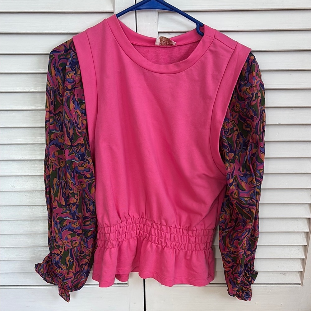 Stylish Pink Top with Patterned Sleeves